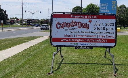 Mobile sign next to Highway 2 in Bowmanville