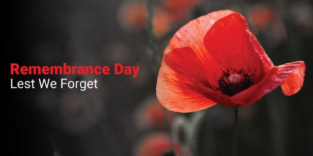 Image of a poppy with the words Remembrance Day - Lest We Forget