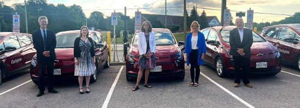 Councillor Joe Neal, Councillor Corinna Traill, Councillor Margaret Zwart, Councillor Janice Jones, and Councillor Ron Hooper stand with Clarington’s new light-duty EV fleet.