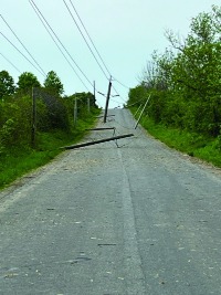 Broken hydro poles following the May 21 storm