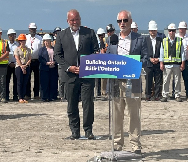 Clarington Mayor Adrian Foster stood with Todd Smith, Minister of Energy, at the announcement that the Ontario government will work with Ontario Power Generation (OPG) to commence planning and licensing for three additional small modular reactors (SMRs) for a total of four SMRS at Darlington.