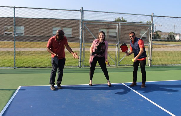 Councillors Granville Anderson, Corinna Traill and Sami Elhajjeh try their hand at pickleball.