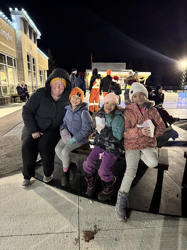 Family enjoys popcorn at the Courtice Tree-Lighting Ceremony