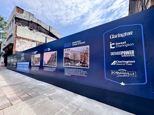 A view of the mural from the opposite angle showing more archival photos.