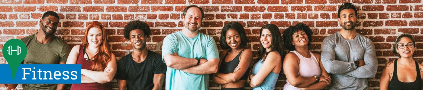 Diverse group of people in active wear smiling.