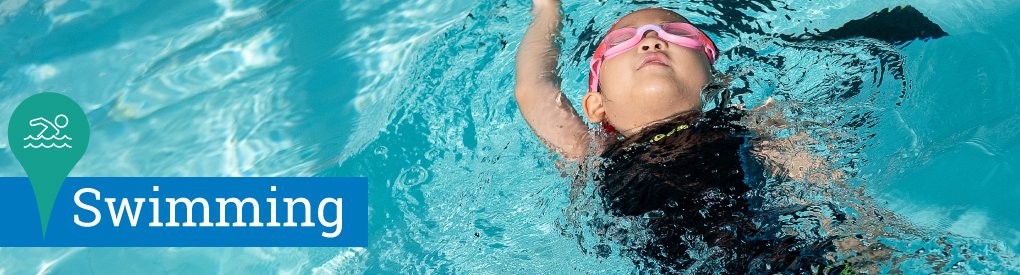 Girl swimming the back stroke