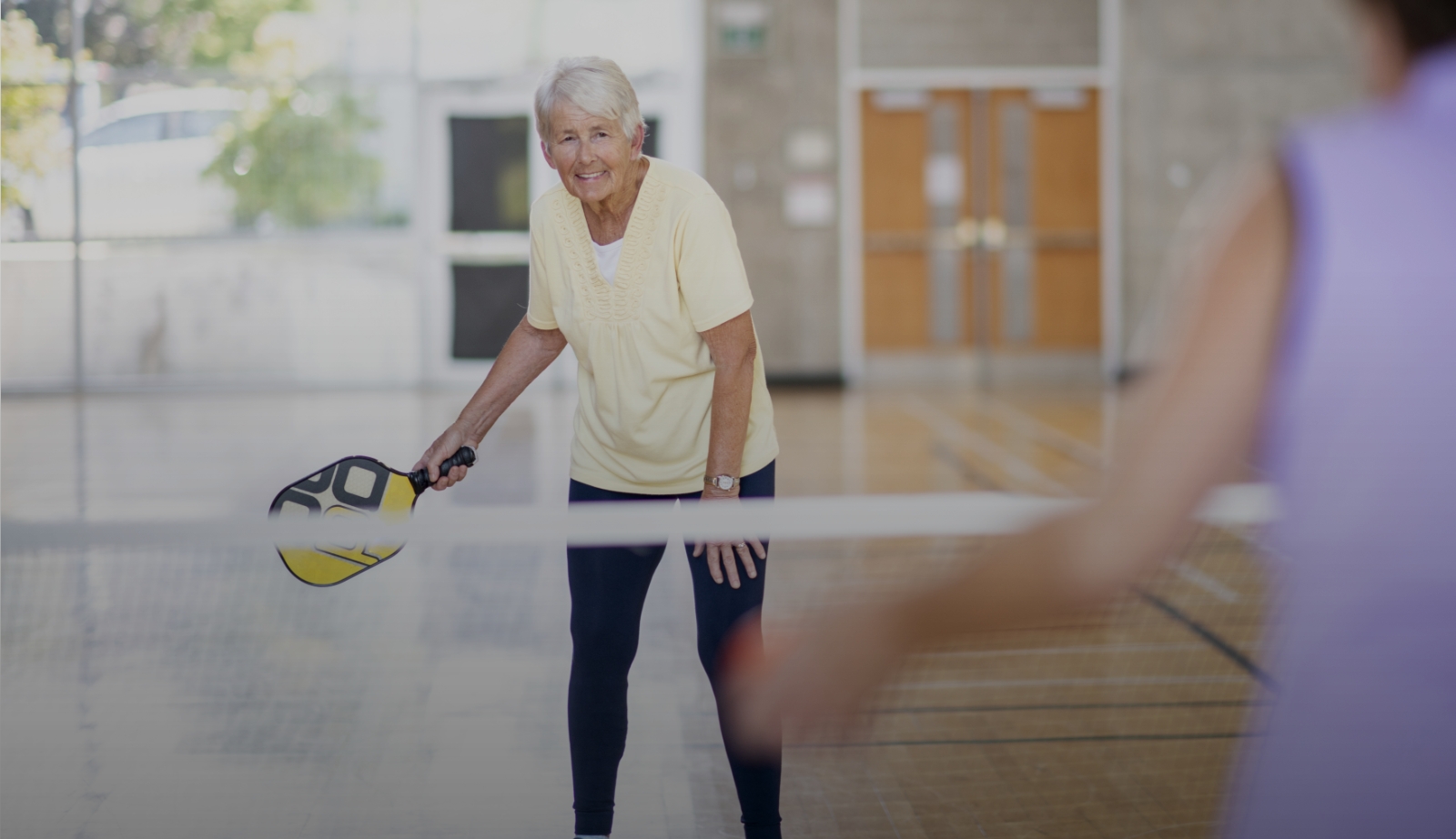 senior woman playing a sport