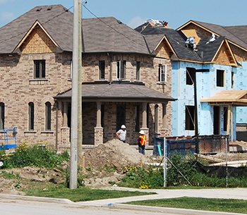 woman typing on a laptop