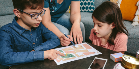 Mom explaining to children the home escape plan