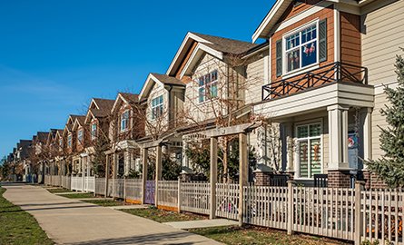 Residential houses on street in a suburban residential area.
