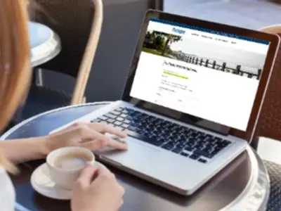 Laptop with a the facility booking form on the screen.