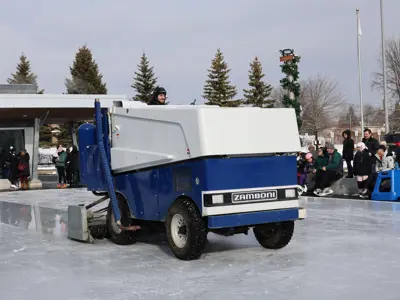 The ice resurfacer smooths out the ice at the Courtice outdoor rink.