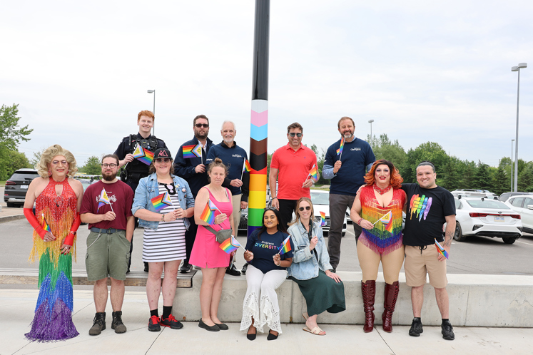 Mayor Foster is joined by members of Council, the Diversity Advisory Committee, municipal staff, and community members to mark the installation of new Pride displays, expanding visibility and inclusion across Clarington.