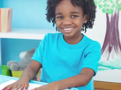 Child creating an art project.
