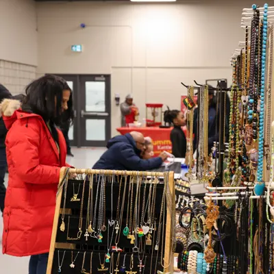Customers shop at vendor booths during the 2026 Black Vendor Village.