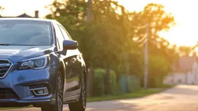 A car parked on a residential street.
