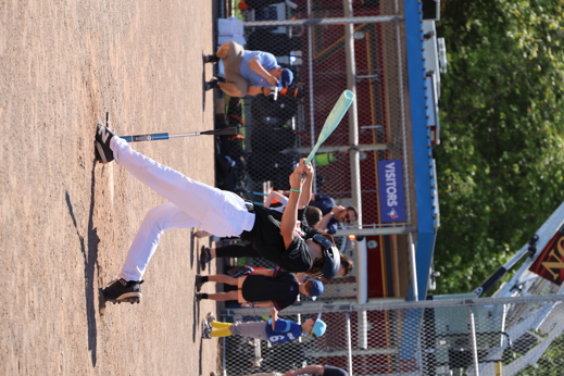 Taking a swing at the ball during the Hit, Pitch and Run Challenge.